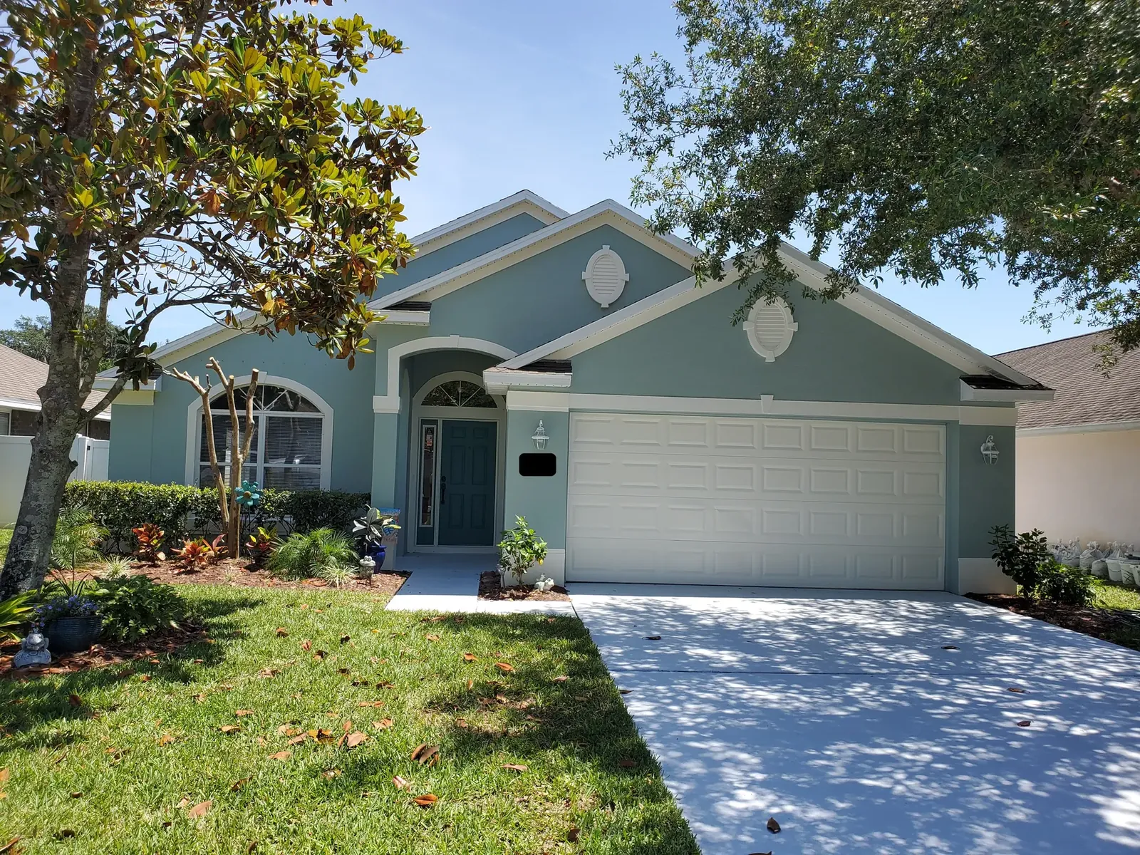 Edgewater blue exterior after painting - real Volusia County painting project