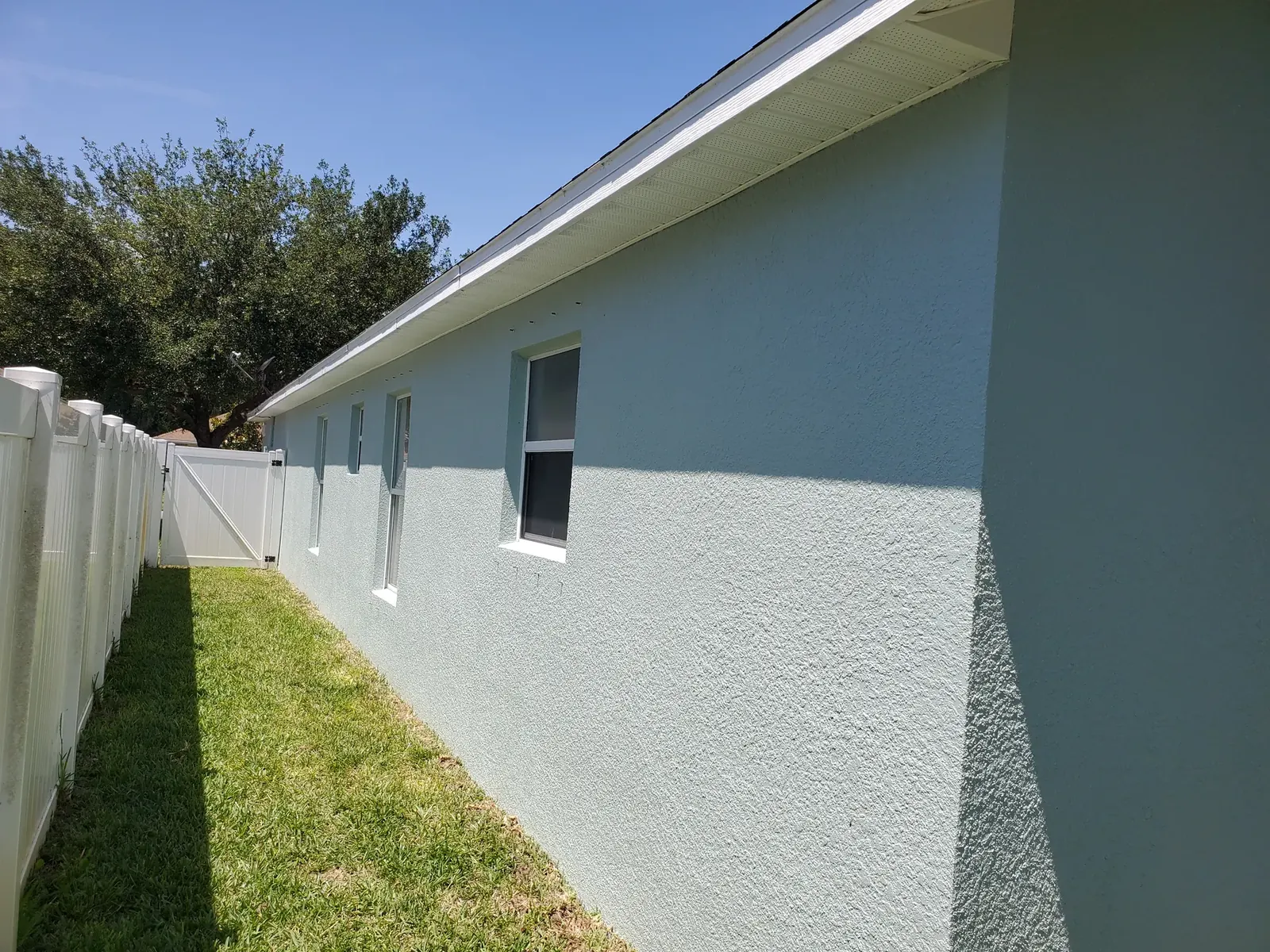 Edgewater blue exterior after painting - real Volusia County painting project