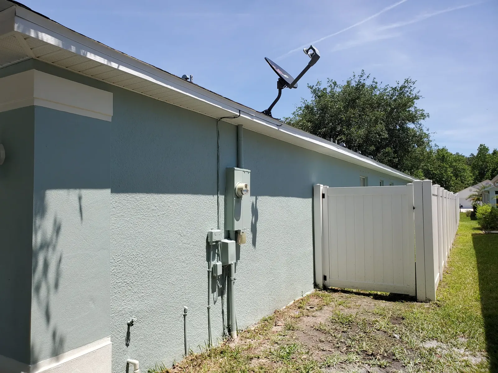 Edgewater blue exterior after painting - real Volusia County painting project