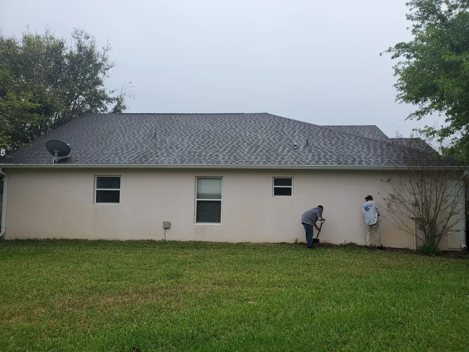 Clean white exterior finish - real Volusia County painting project