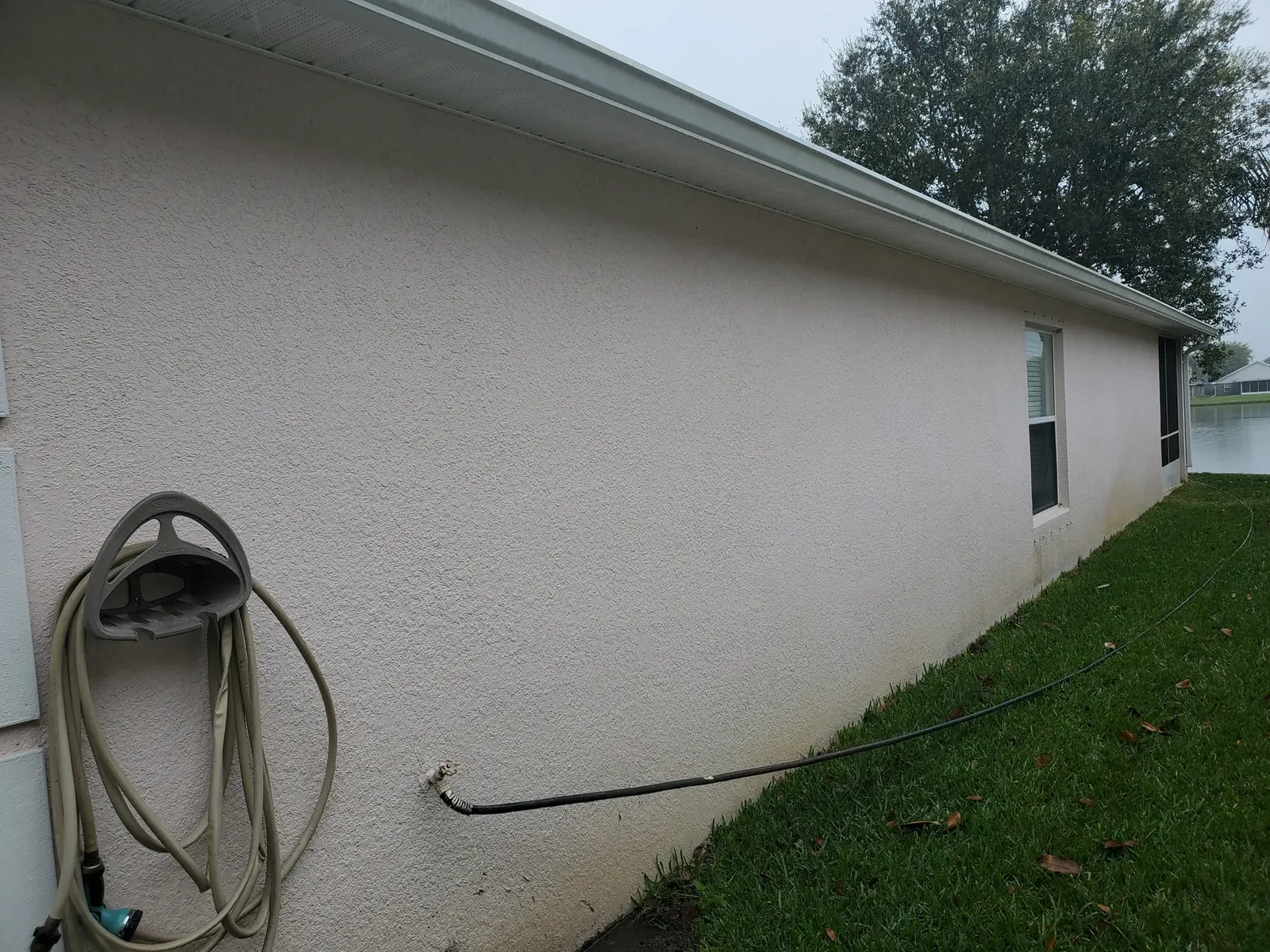 Clean white exterior finish - real Volusia County painting project