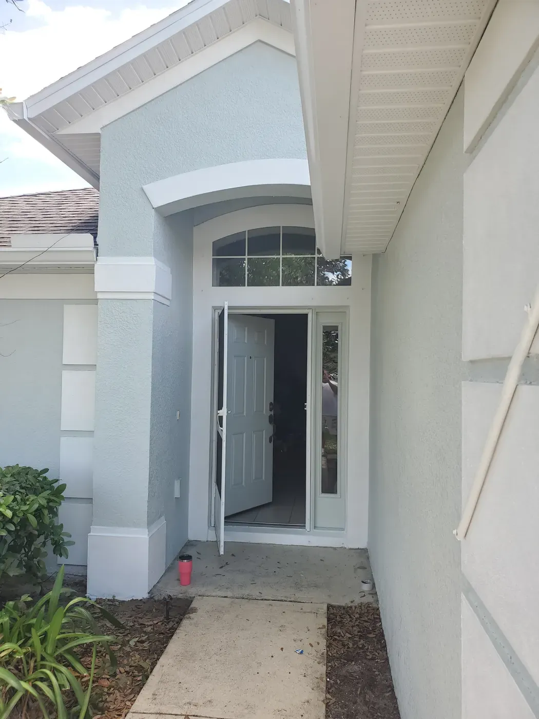Clean white exterior finish - real Volusia County painting project