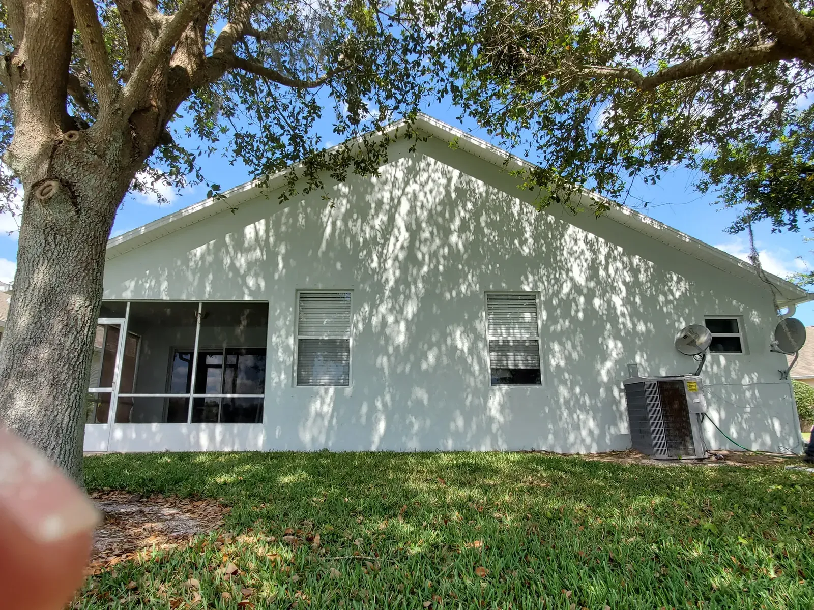 Clean white exterior finish - real Volusia County painting project