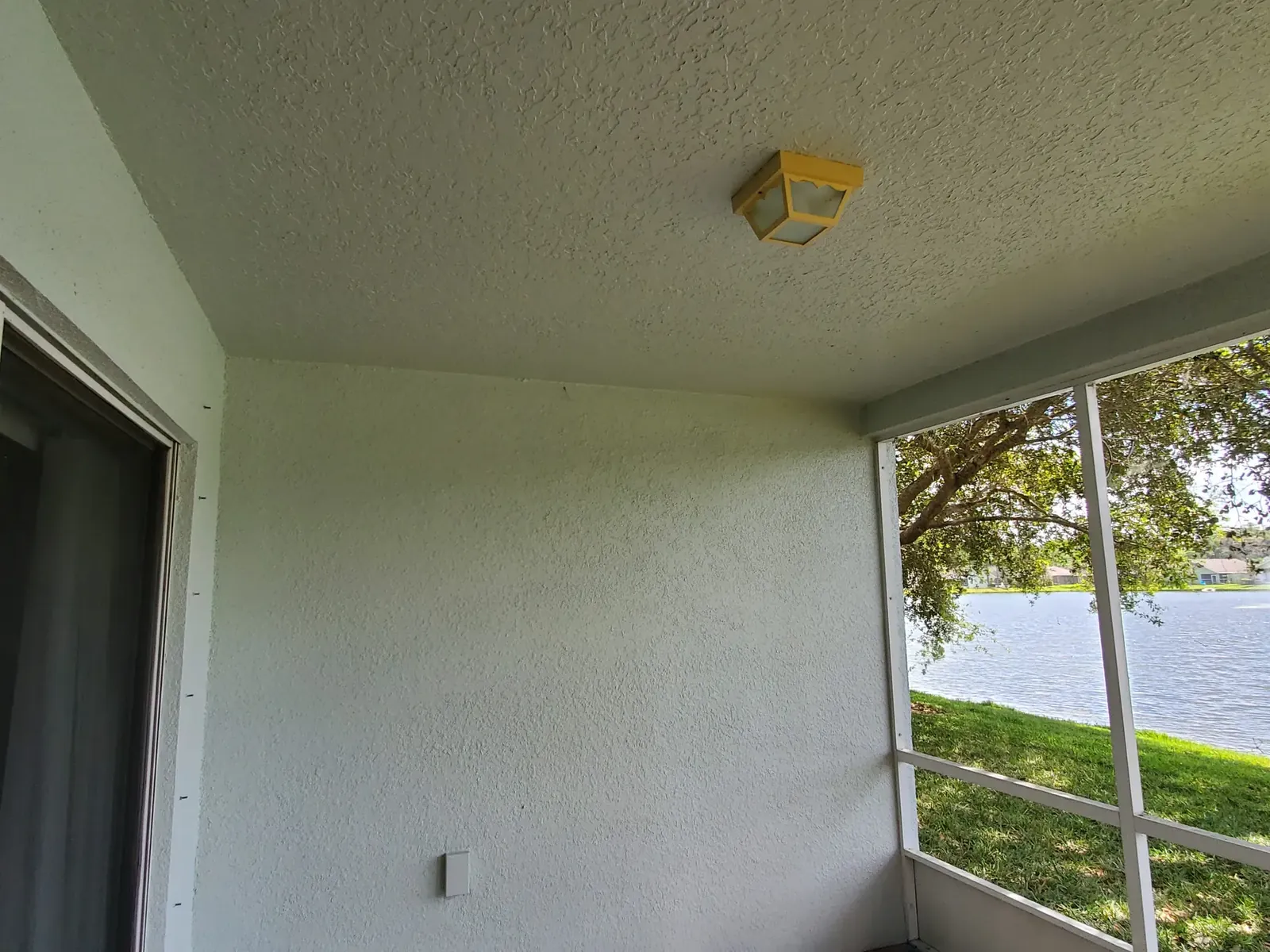 Clean white exterior finish - real Volusia County painting project