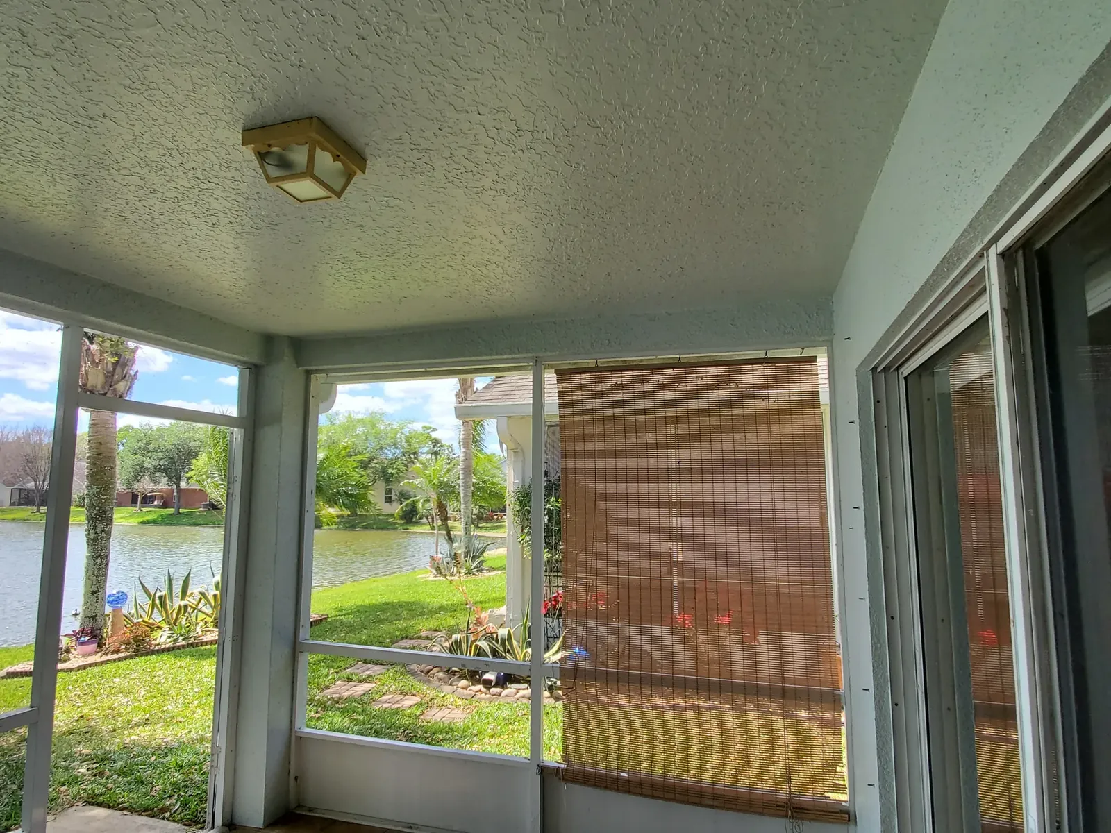 Clean white exterior finish - real Volusia County painting project