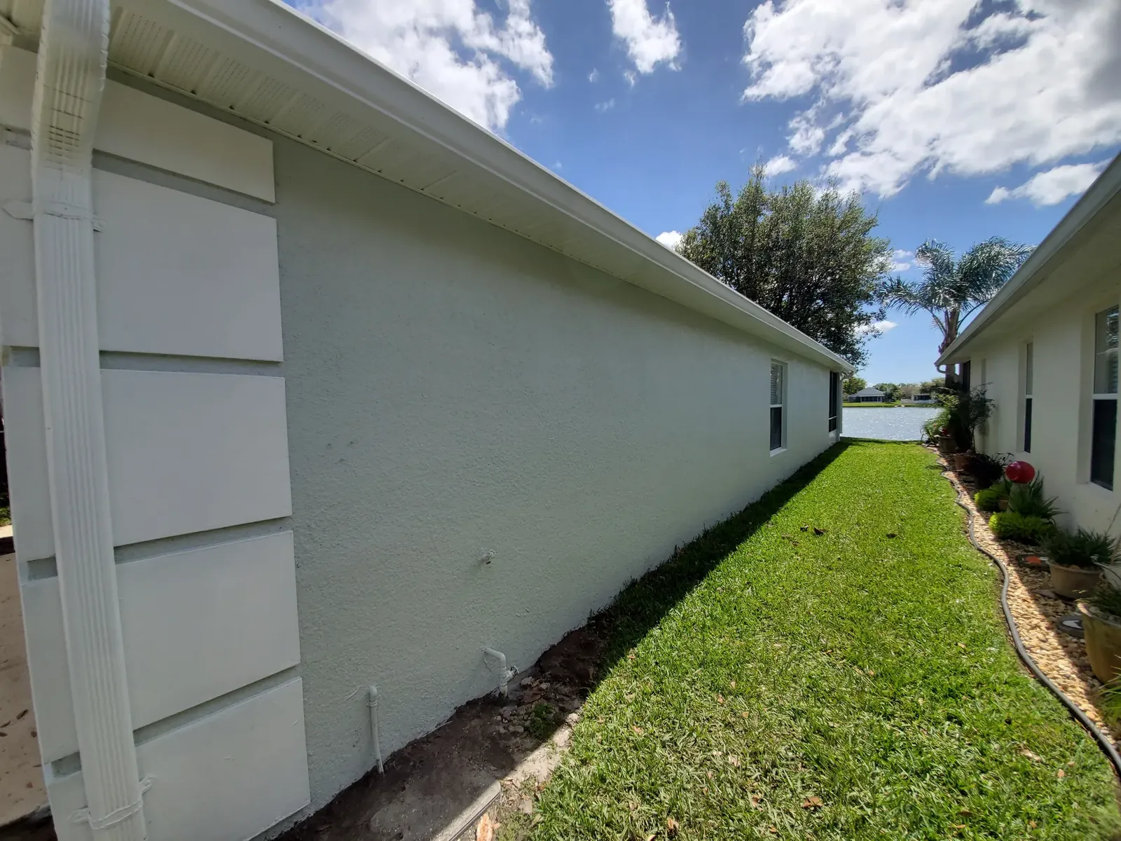 Clean white exterior finish - real Volusia County painting project