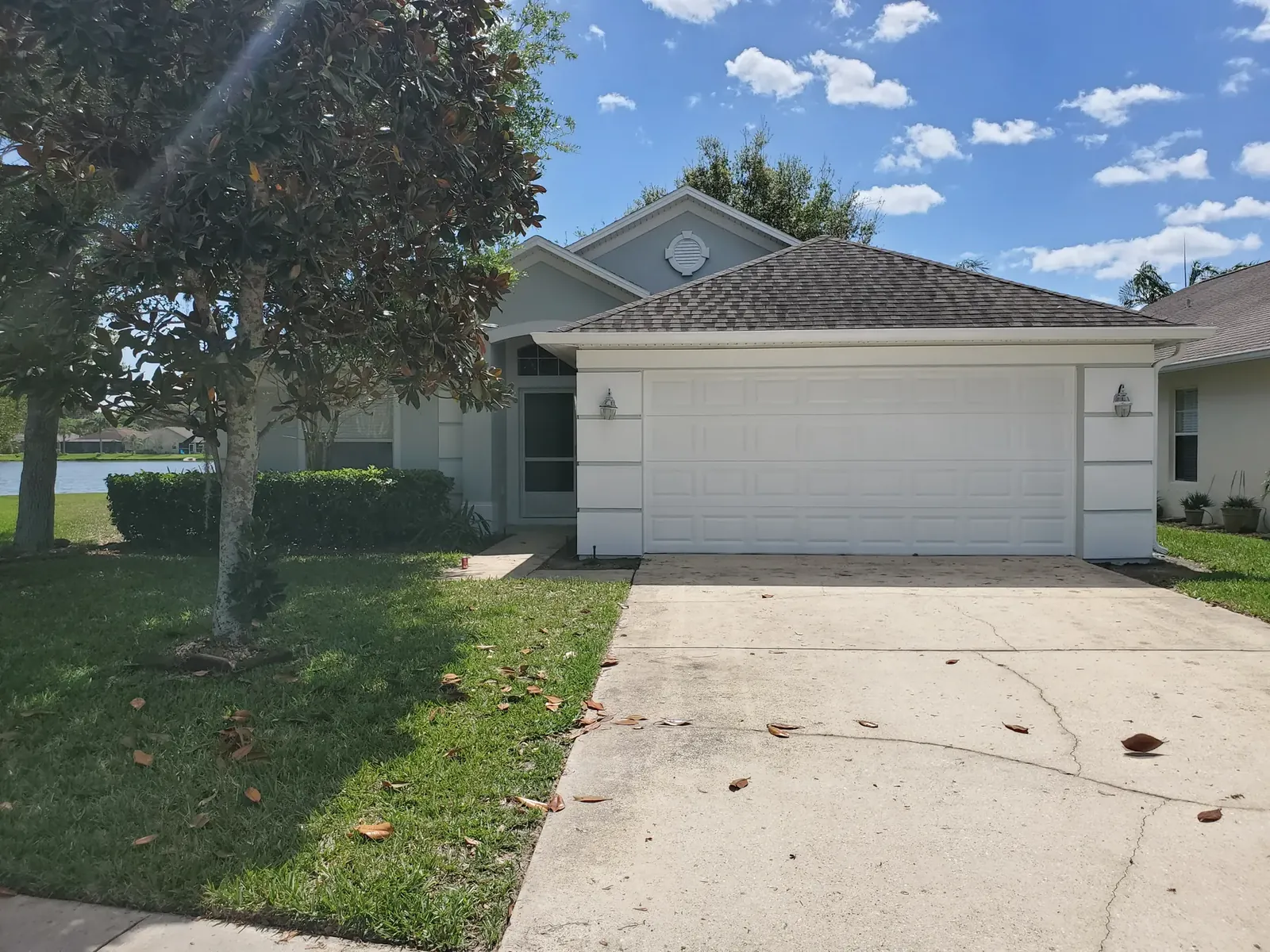 Clean white exterior finish - real Volusia County painting project