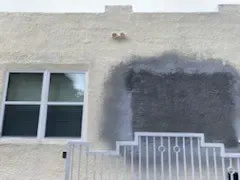 Stucco patch before finish paint - real Volusia County painting project