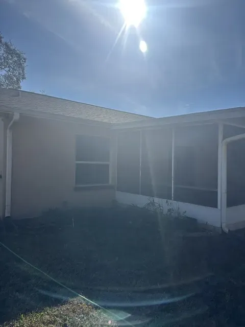 Oak Hill stucco before painting - real Volusia County painting project