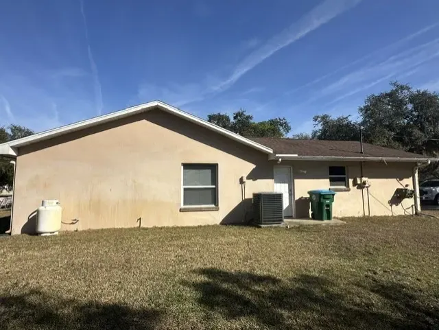 Oak Hill stucco before painting - real Volusia County painting project
