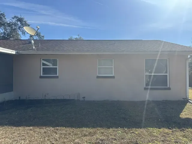 Oak Hill stucco before painting - real Volusia County painting project