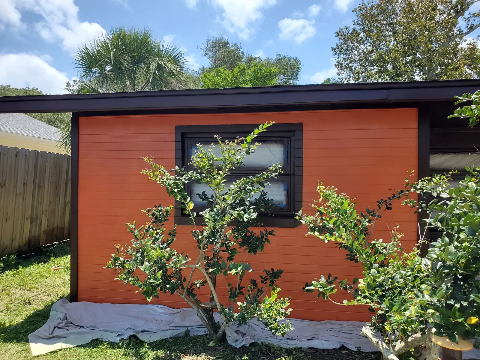 Warm orange exterior after painting - real Volusia County painting project