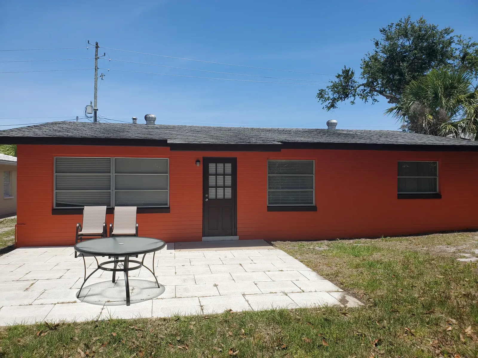Warm orange exterior after painting - real Volusia County painting project