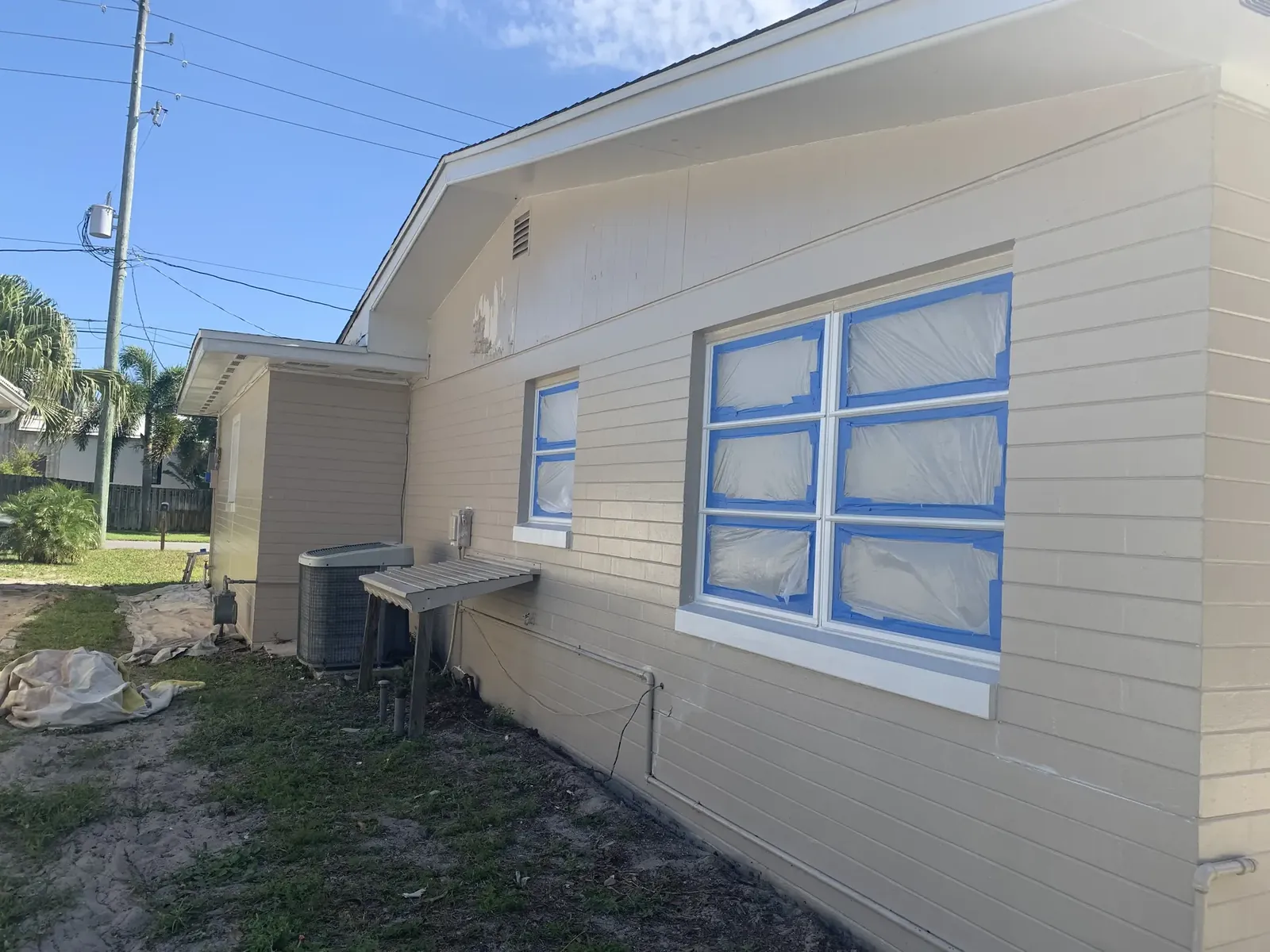 Exterior before the orange finish - real Volusia County painting project