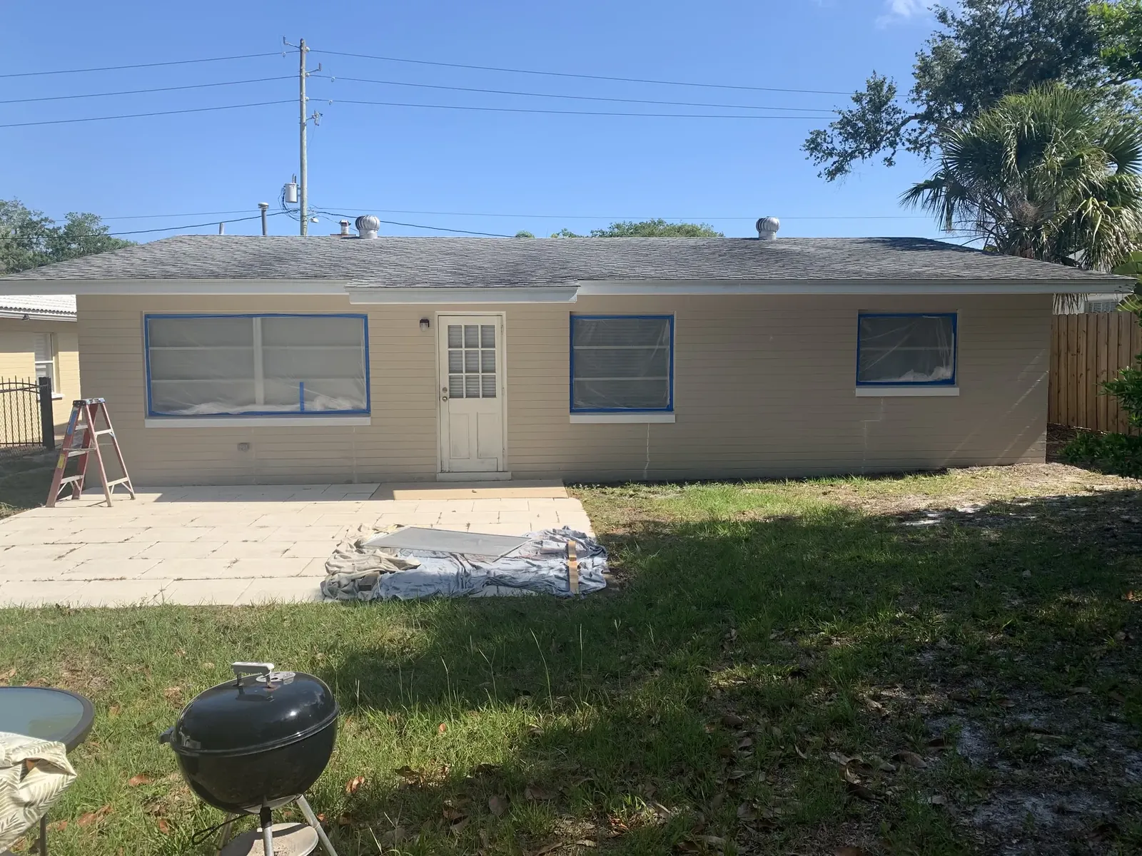 Exterior before the orange finish - real Volusia County painting project