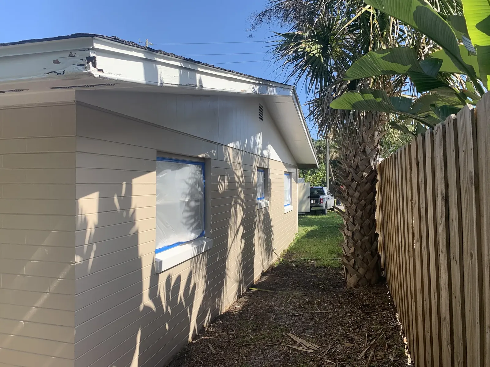 Exterior before the orange finish - real Volusia County painting project
