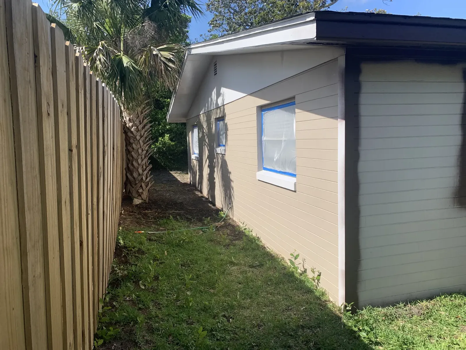 Exterior before the orange finish - real Volusia County painting project