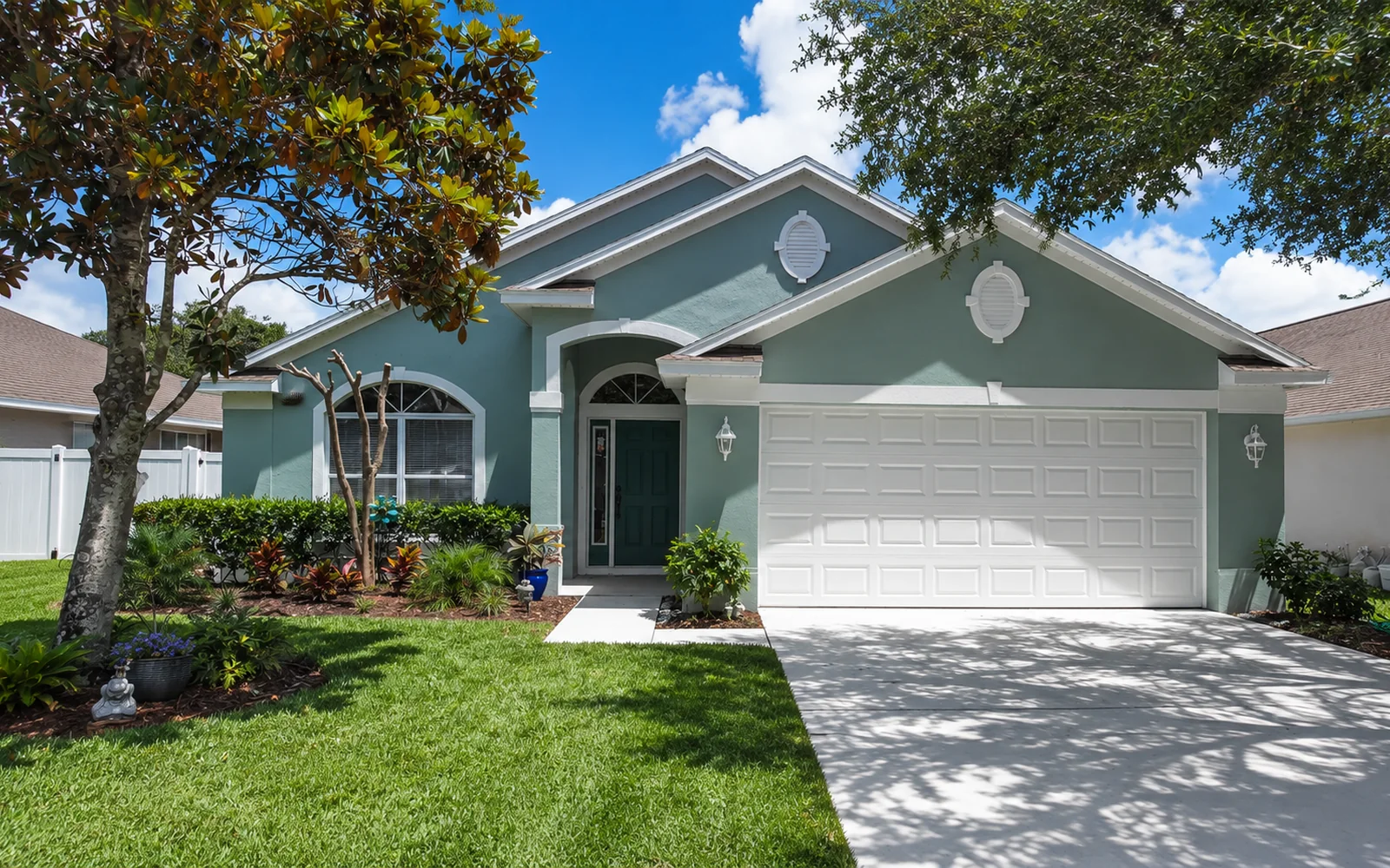 Fresh exterior paint on a clean Florida stucco home